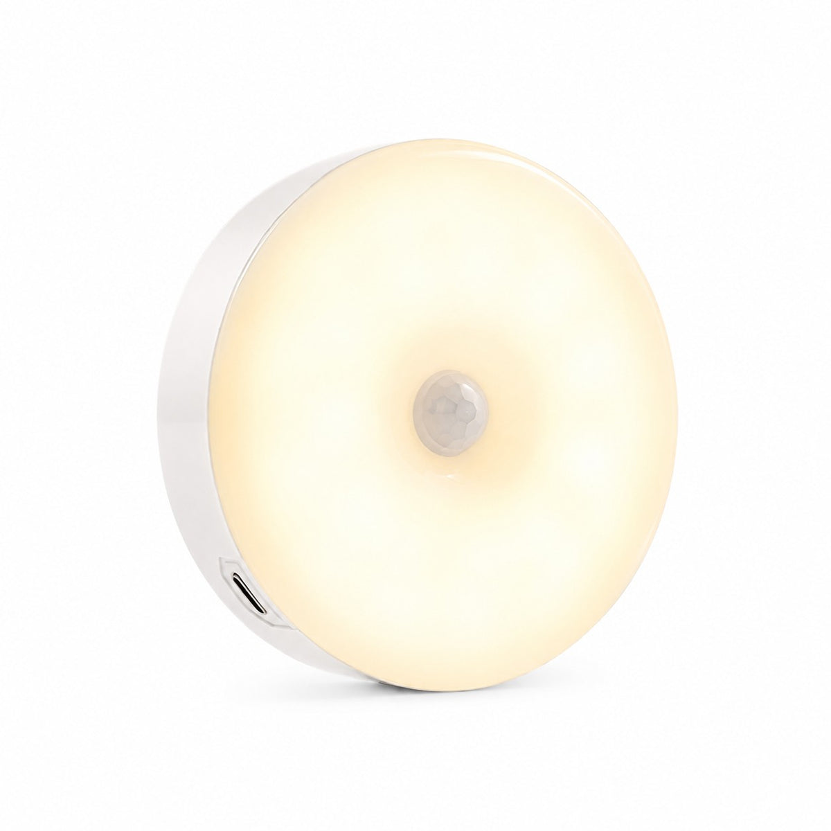 Lynova motion sensor LED light with a warm white glow and a sleek, round wireless design on a white background.