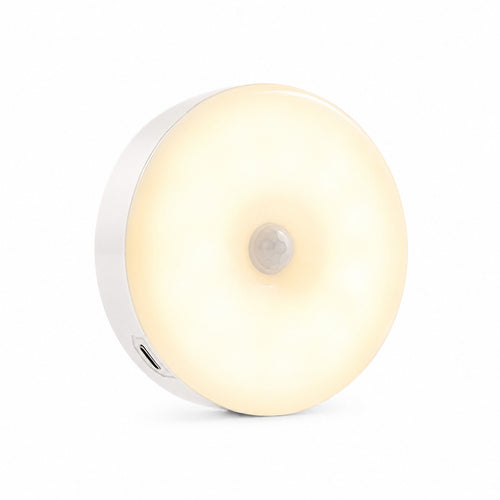 Lynova motion sensor LED light with a warm white glow and a sleek, round wireless design on a white background.